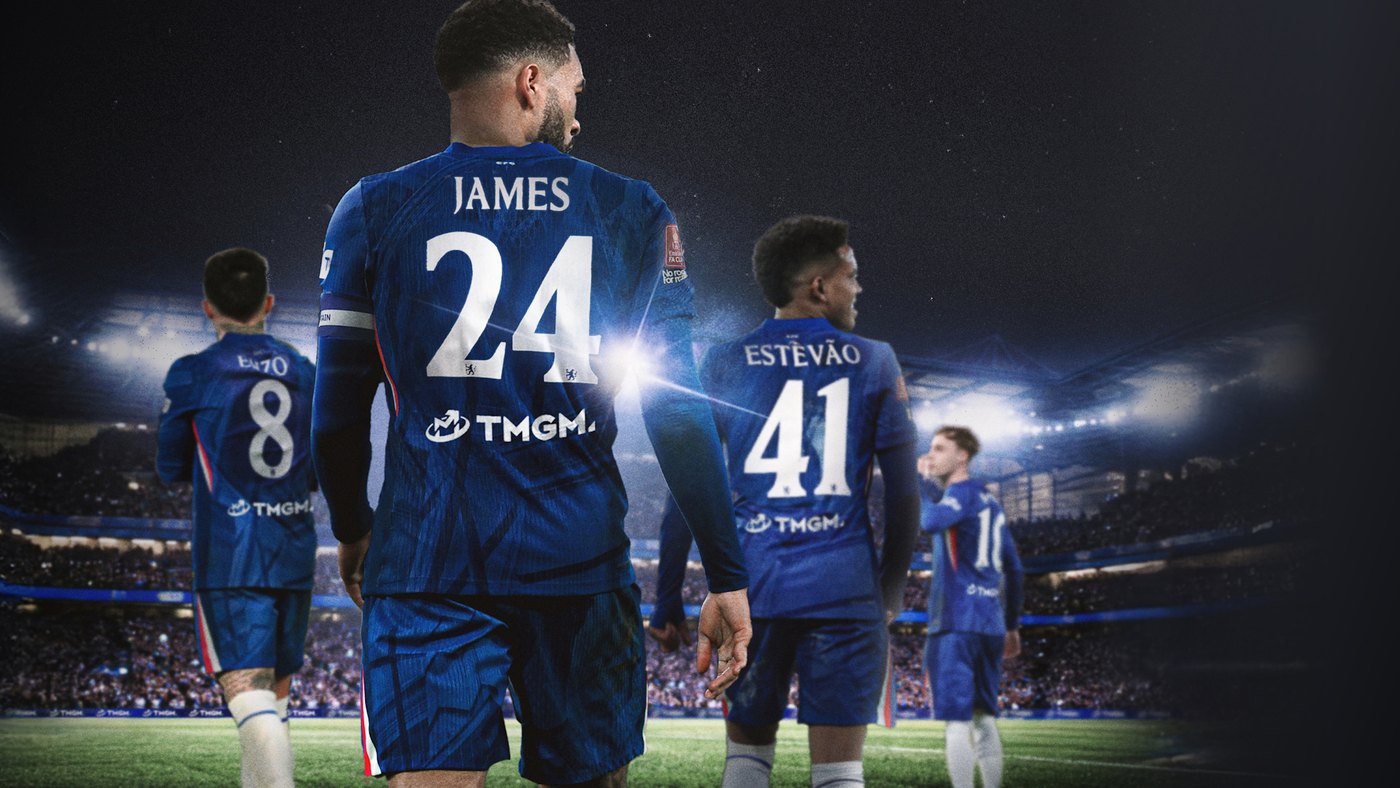 Chelsea FC players walking out with TMGM on the back of their shirts